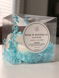 A clear boxed heart shaped white unscented, eczema-friendly bath bomb for sensitive skin, handpressed 4.1 oz